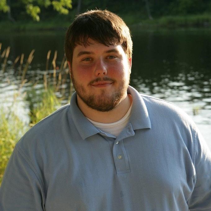 man in blue shirt