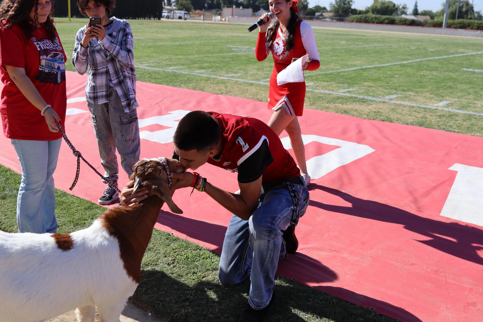 students and staff at the homecoming rally