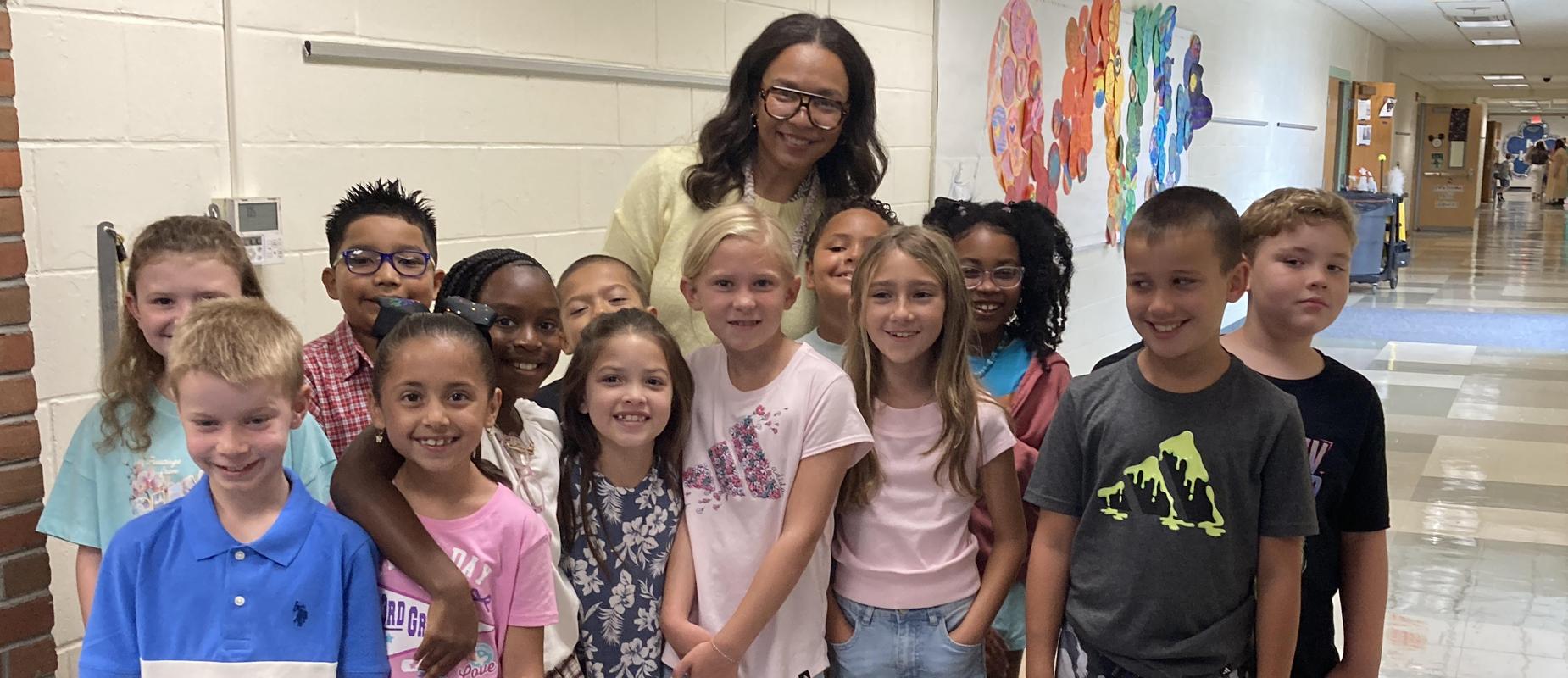 Welcome back Laurel Ledge students! picture of students and teacher