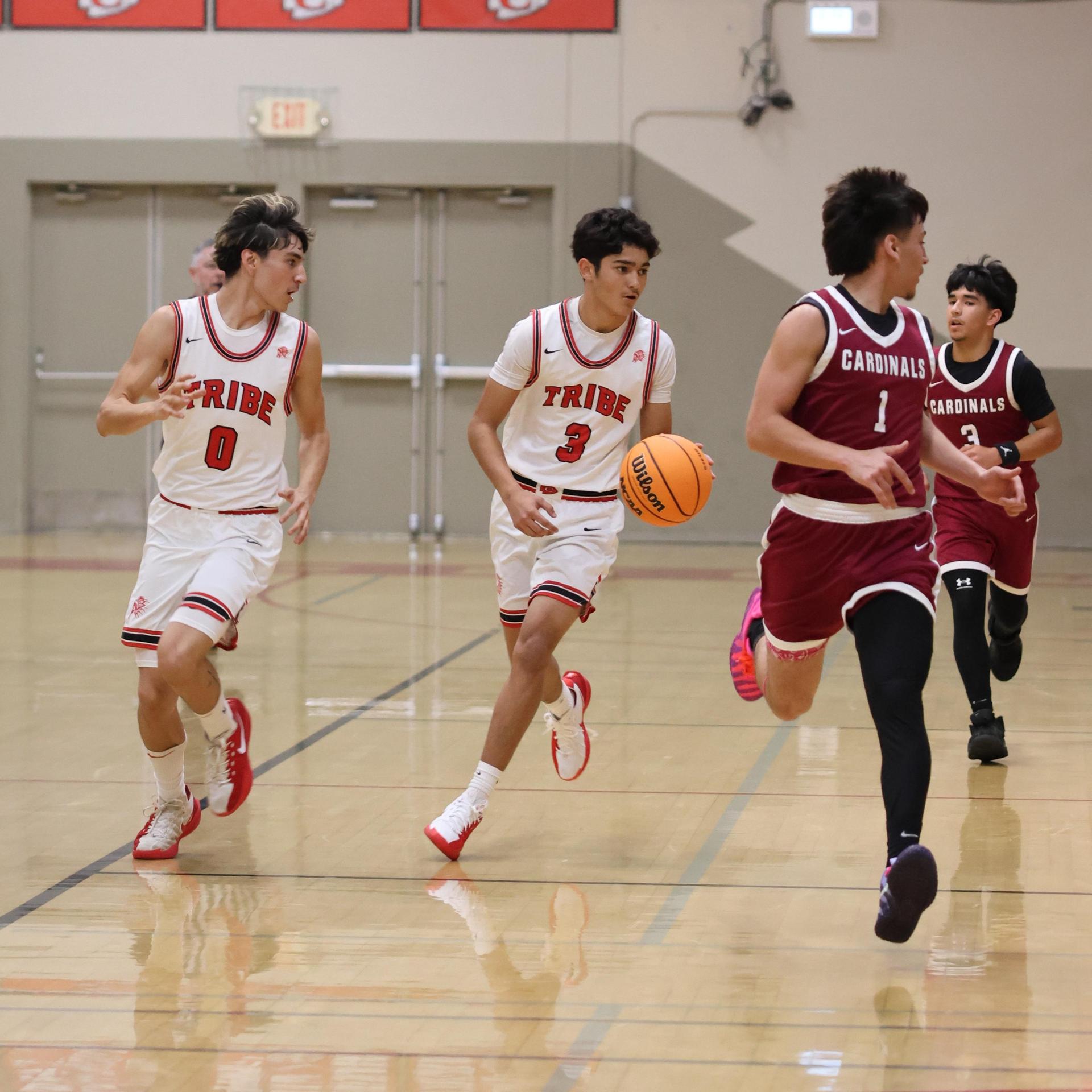 Varsity Boys Basketball playing vs. Orosi 12