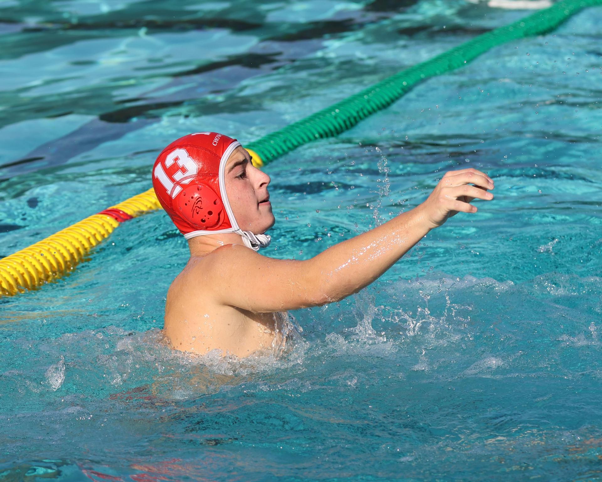 Boys playing water polo against Yosemite