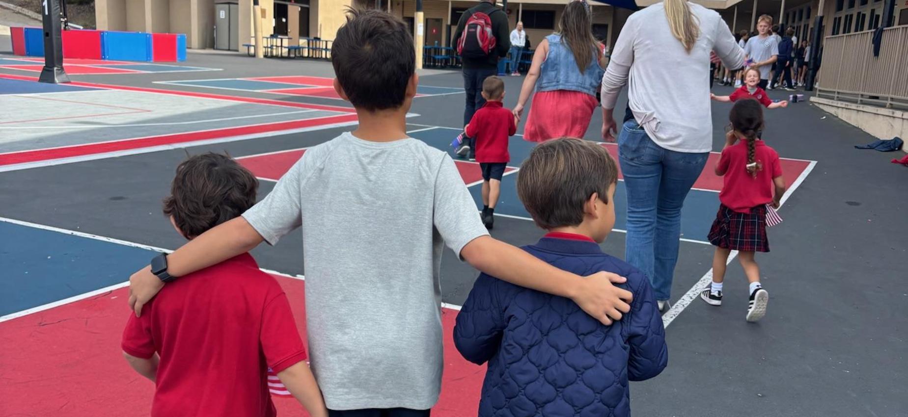 6th grade student walking with TK Friendship Buddies