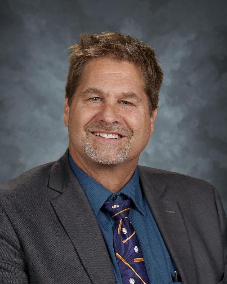 smiling Greg Hajeck in suit