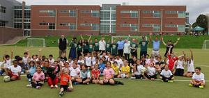 Group photo of kids and coaches