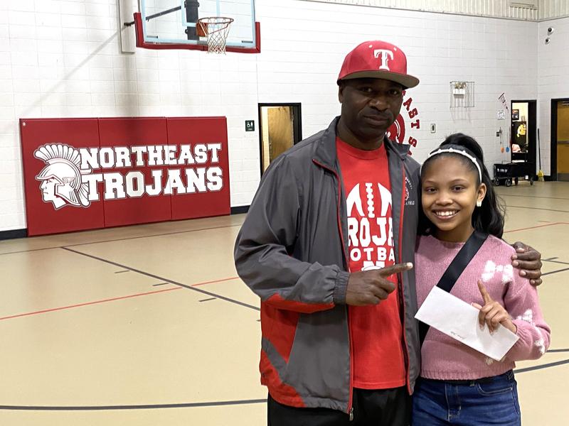 Northeast Middle School Football Coach Perry Buxton FCA Coach of the Year and NEMS 6th Grader Kinley Vincent, FCA Student Athlete of the Year