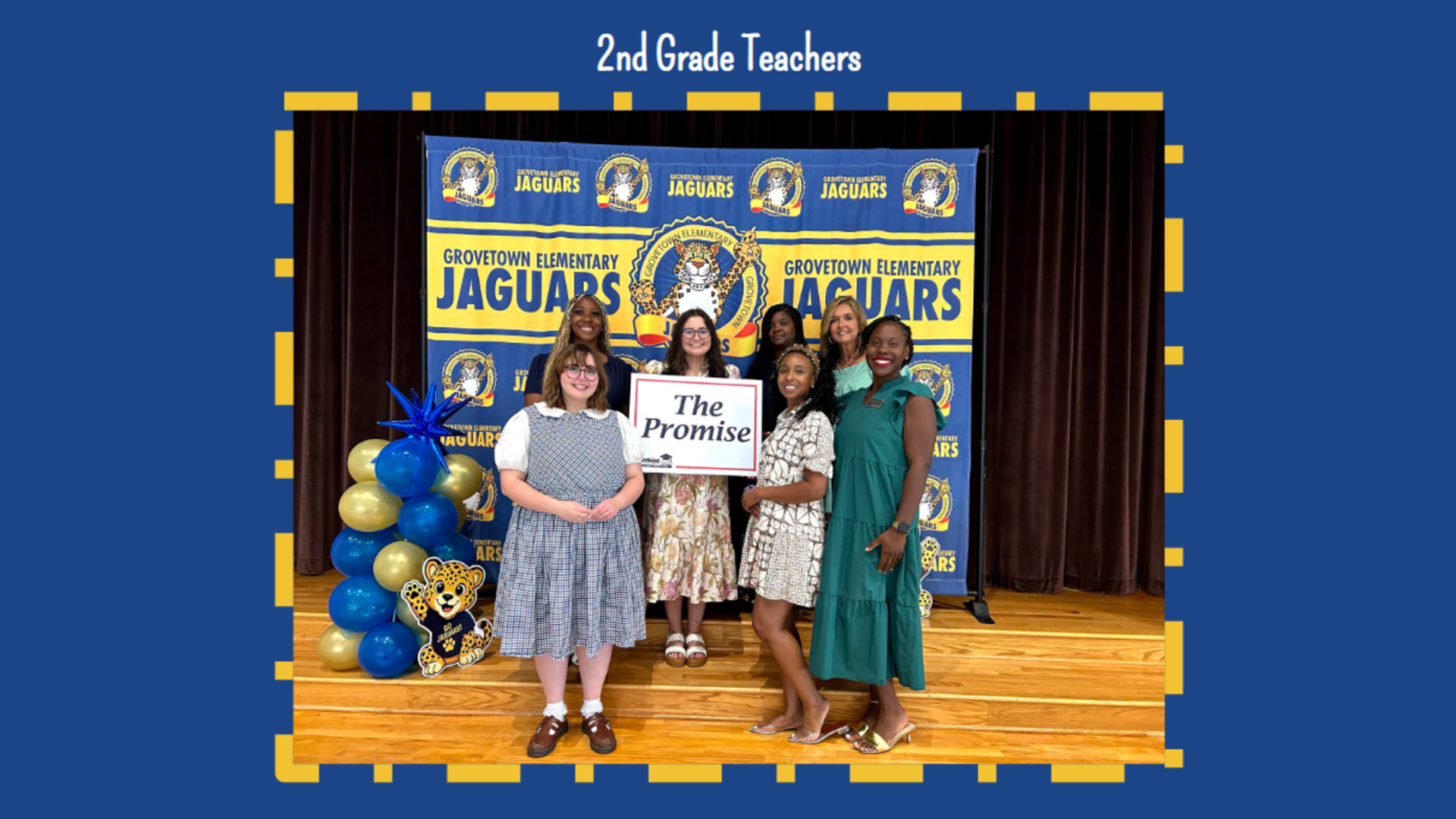 Group of 2nd grade teachers holding a sign that reads 'The Promise'.