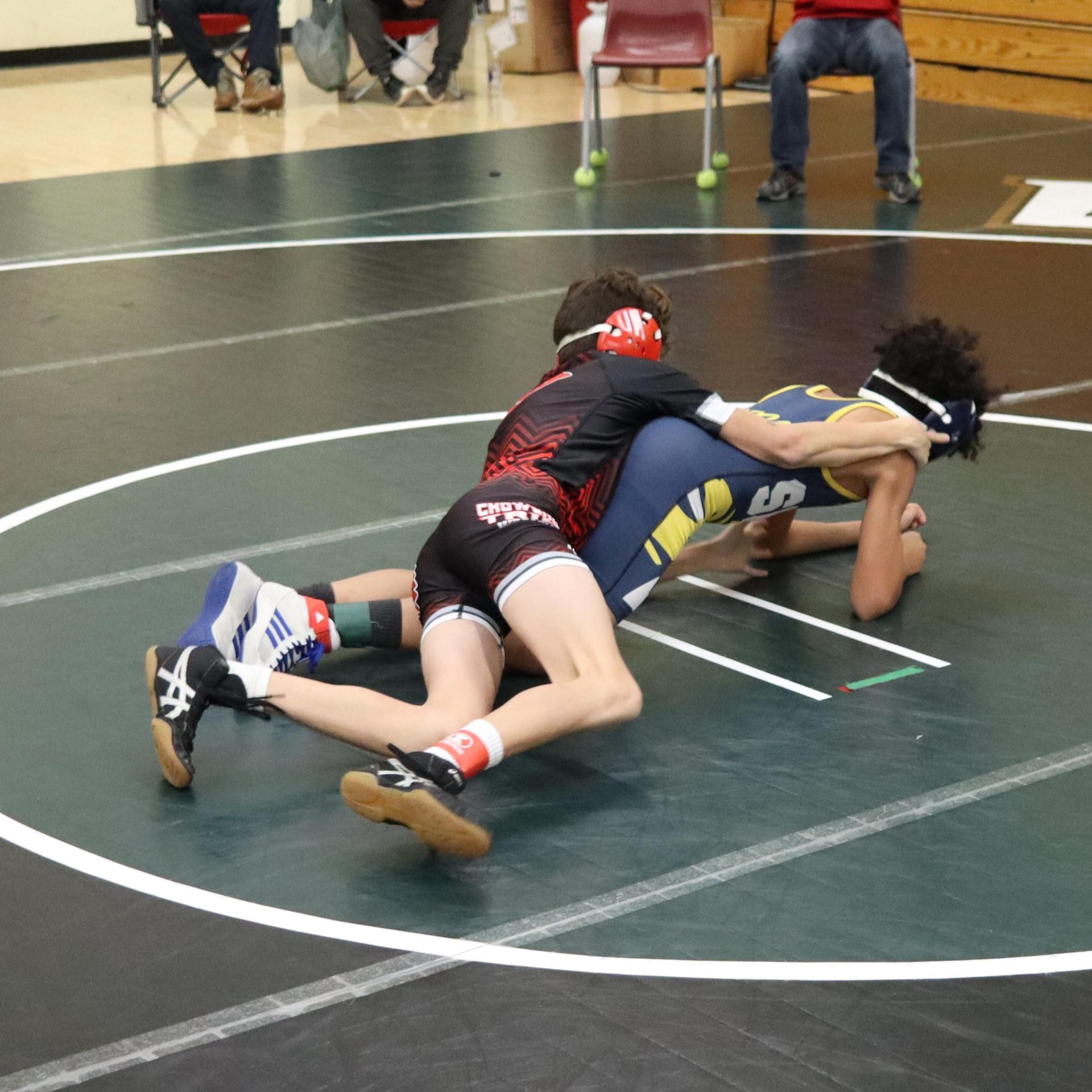 wrestlers in action at the Hawks invitational