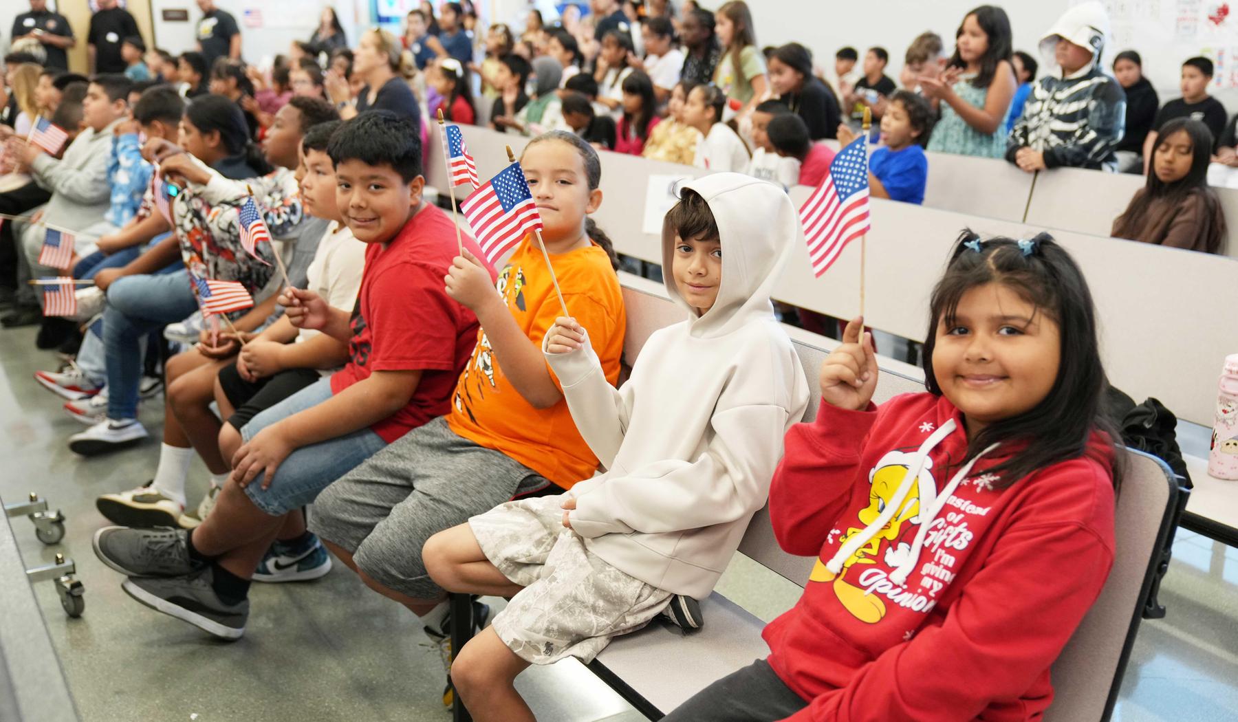 Students Waving Flags