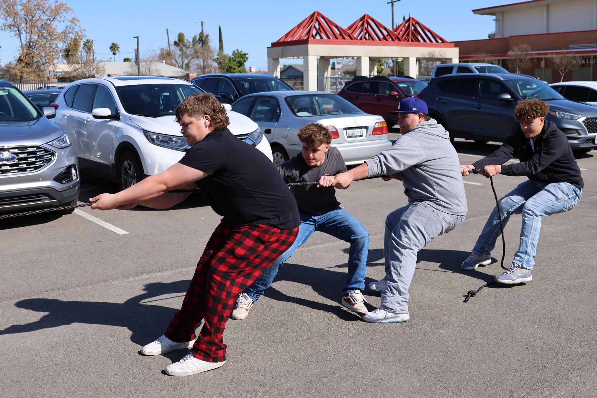 students and staff enjoying the truck pull