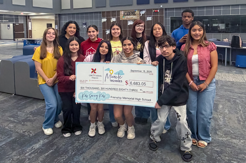 Memorial High check presentation to Children's Miracle Network
