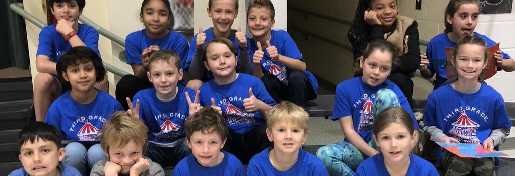 3rd graders on risers for assembly