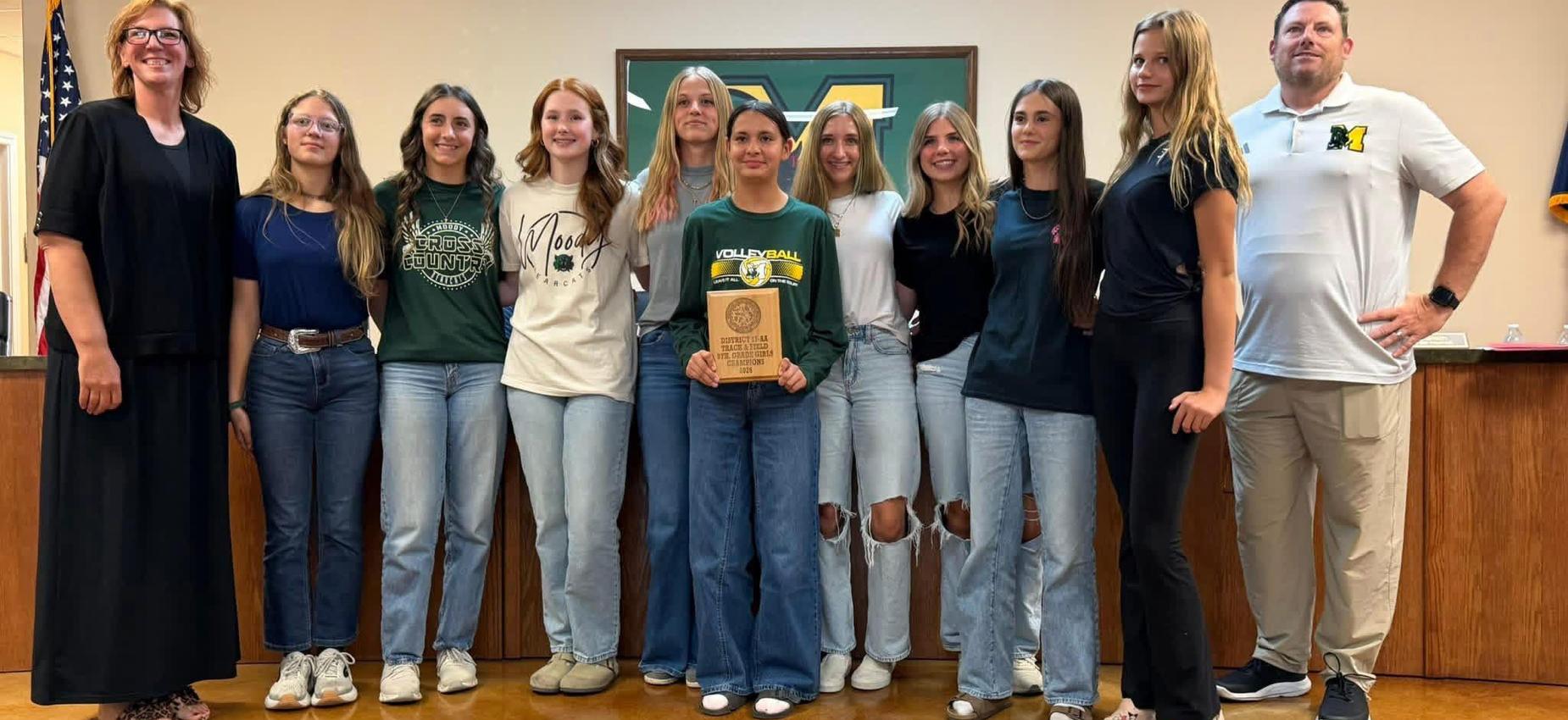 8th grade girls track team with coaches...and their district champ plaque