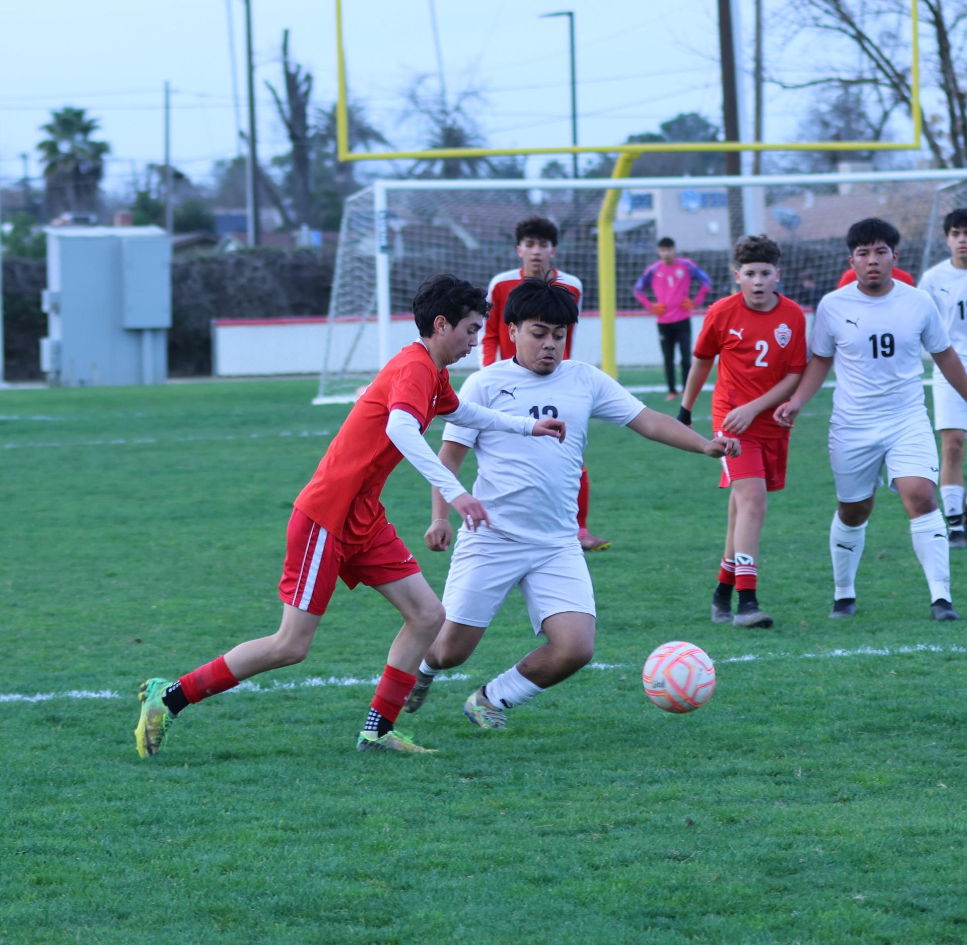 junior varsity boys playing soccer against washington union