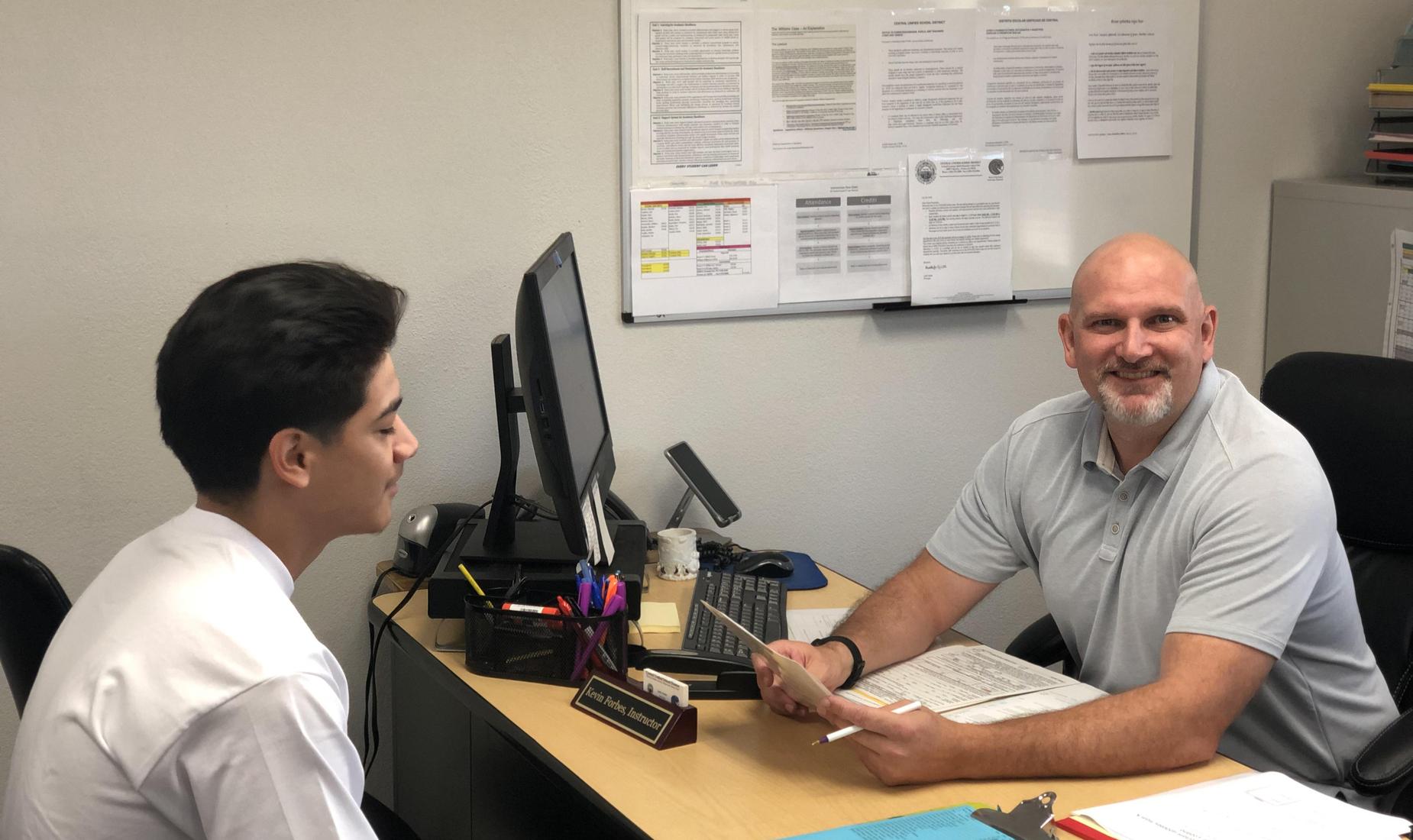 A C.L.A.S.S. counselor advising a student