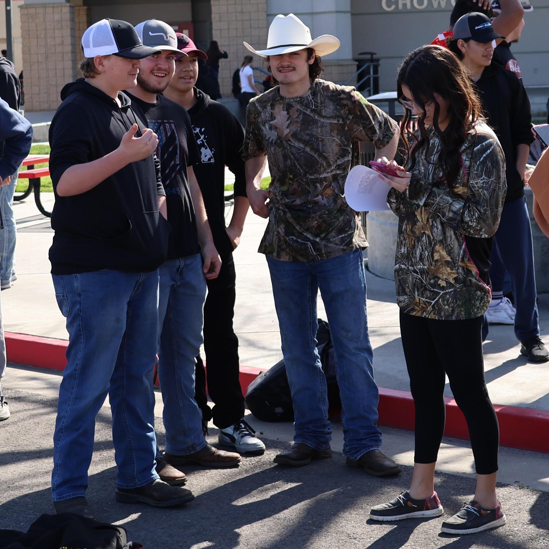 students and staff enjoying the truck pull