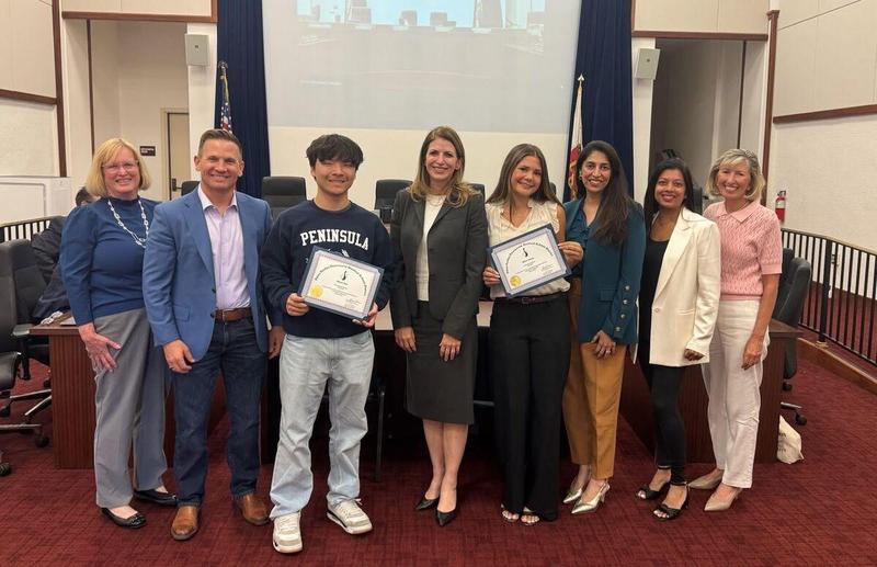 Student Board Members Mason Kim and Malia Tamilin with Board of Education and Superintendent