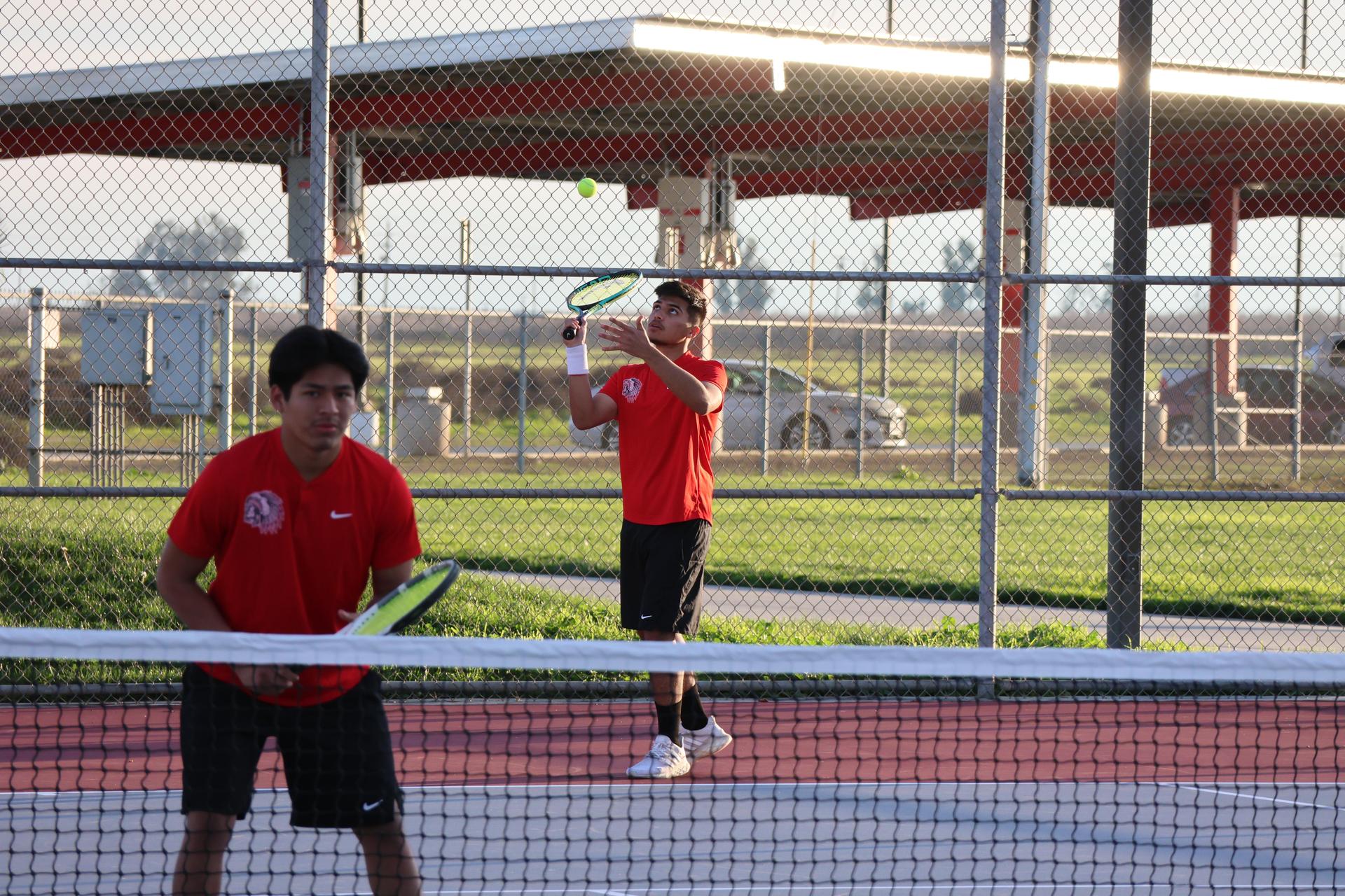 CUHS Boys playing tennis against coalinga
