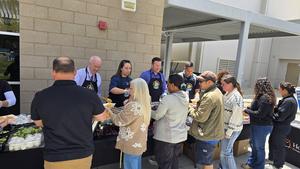 EUHSD Board Members and Cabinet Serve Nachos to Staff Members