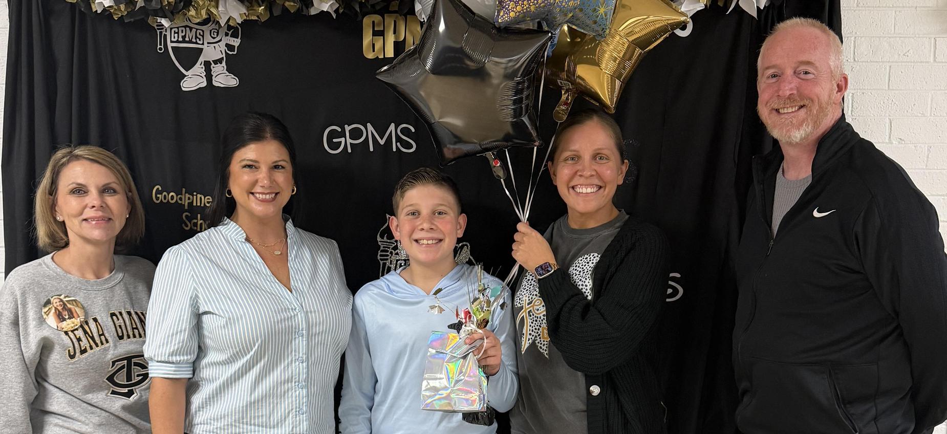 Smiling people with balloons