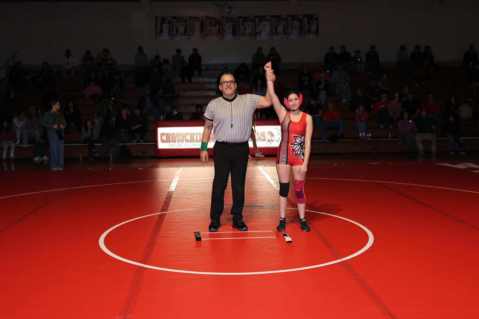 Wrestling winners with hands up 99