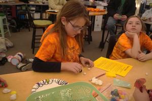 A team member works on a spontaneous challenge.