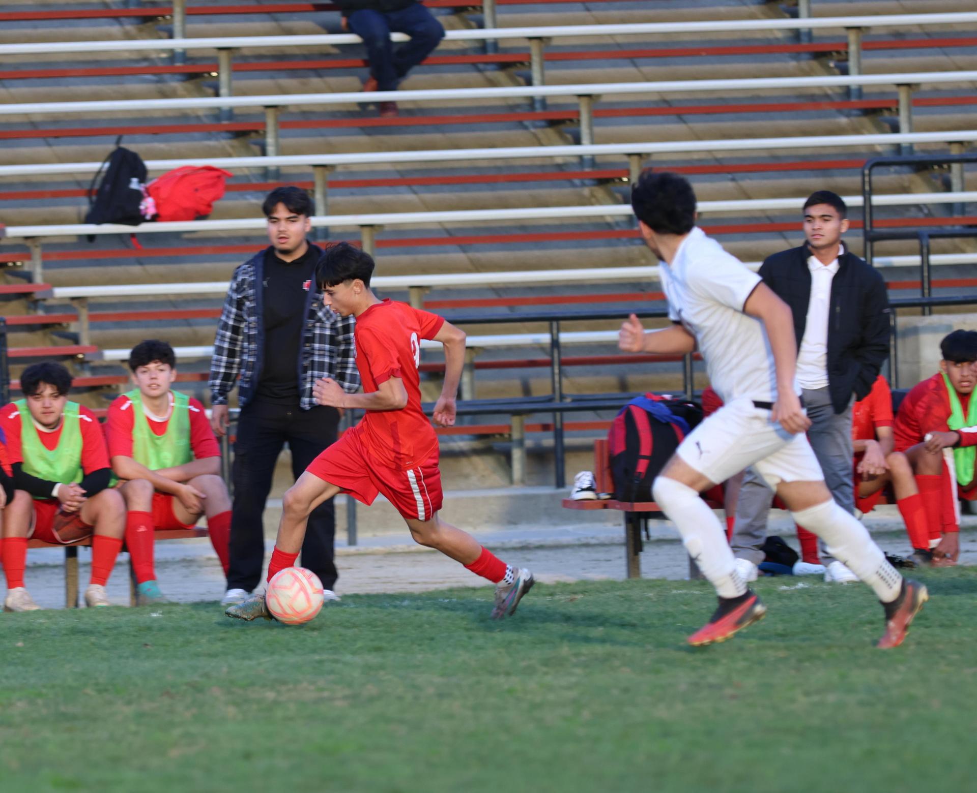 junior varsity boys playing soccer against washington union