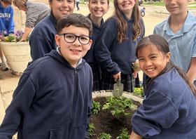 Students helping in the Garden