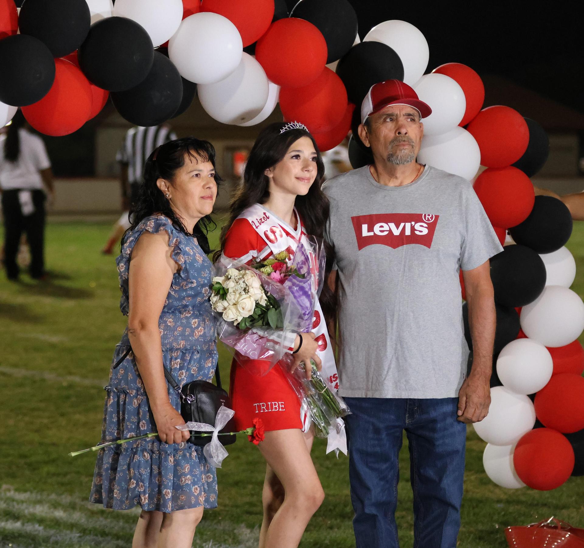 seniors and their escorts celebrating senior night