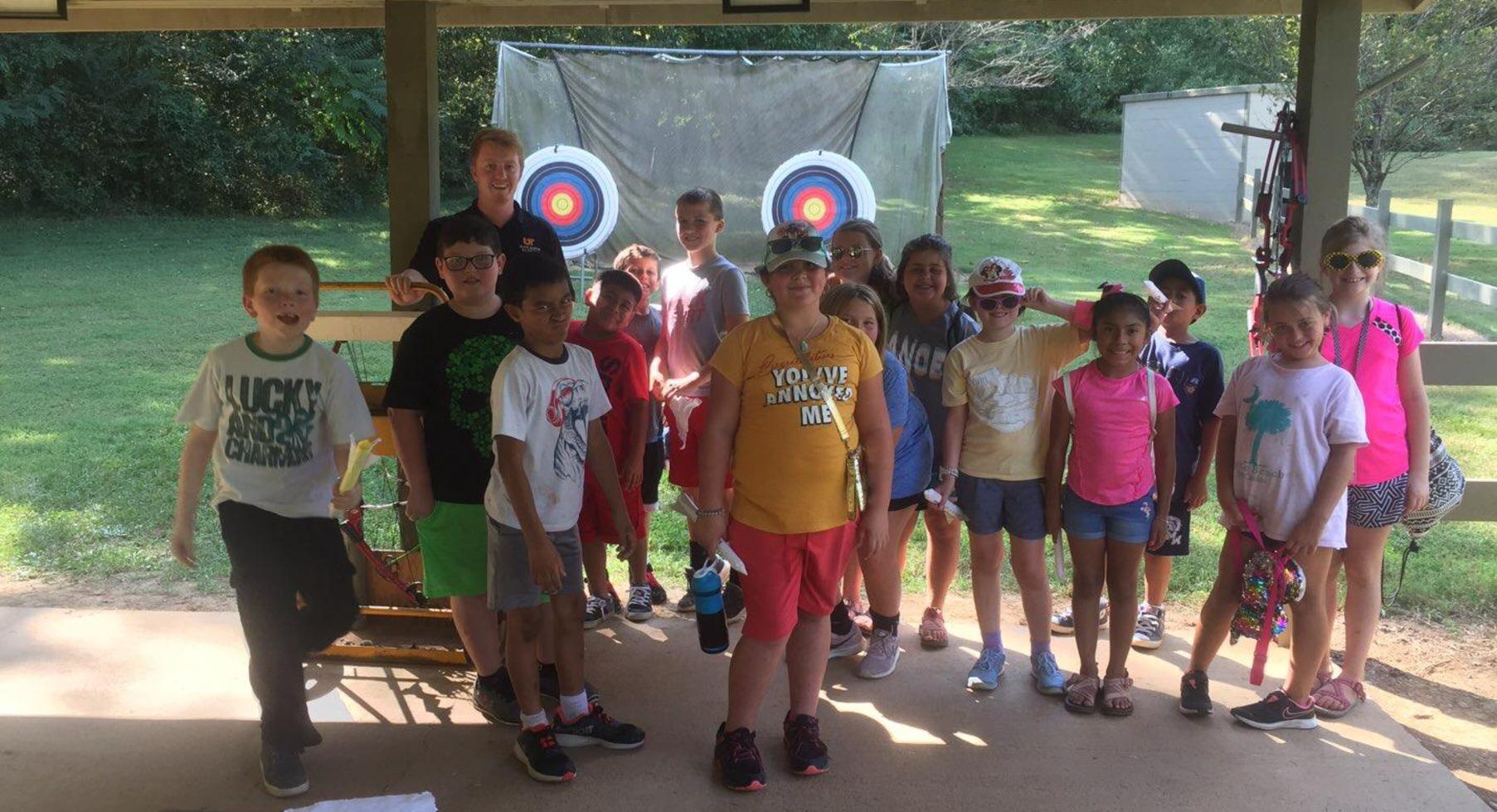 Students at archery target.