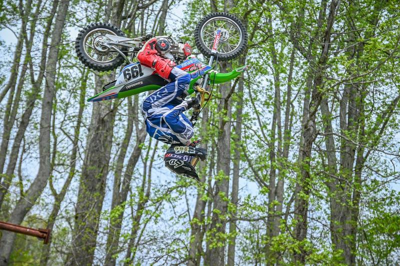 rider doing a backflip on a dirtbike
