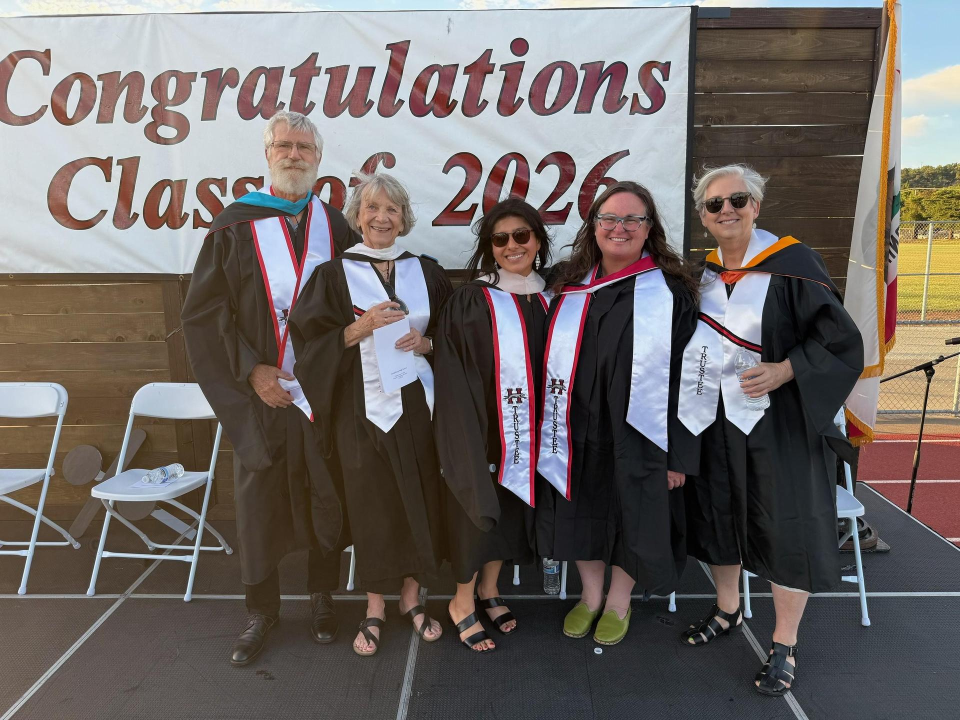 Photo of the HUSD School Board at high school graduation