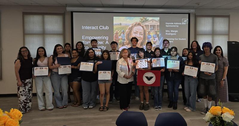 A group of California High students display their certificates of recognition.
