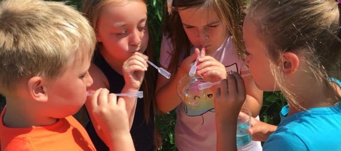 Testing our homemade bubbles!