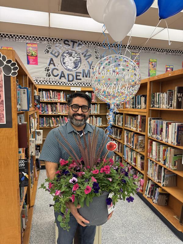 Gerardo Gomez announced as Teacher of the Year.