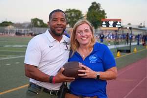 Principal Pratt and Principal Madrigal take a group photo