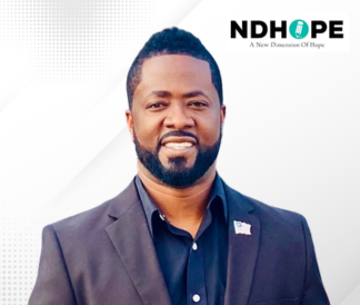 Ebenezer Norman with New Dimension of Hope logo