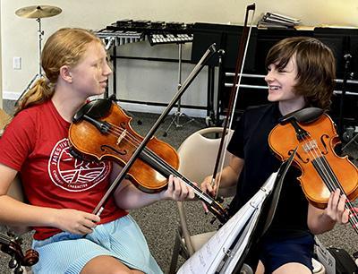 James River Day School student musicians enjoying playing music.