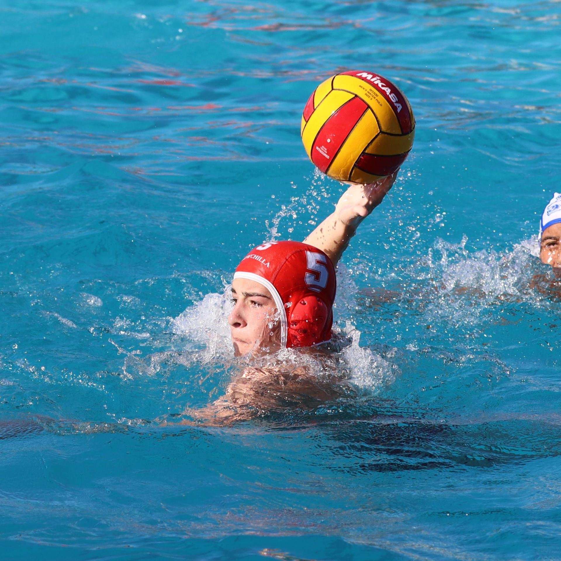 boys playing water polo against Madera