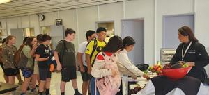 Students in line to try the Jamaican Jerk Chicken