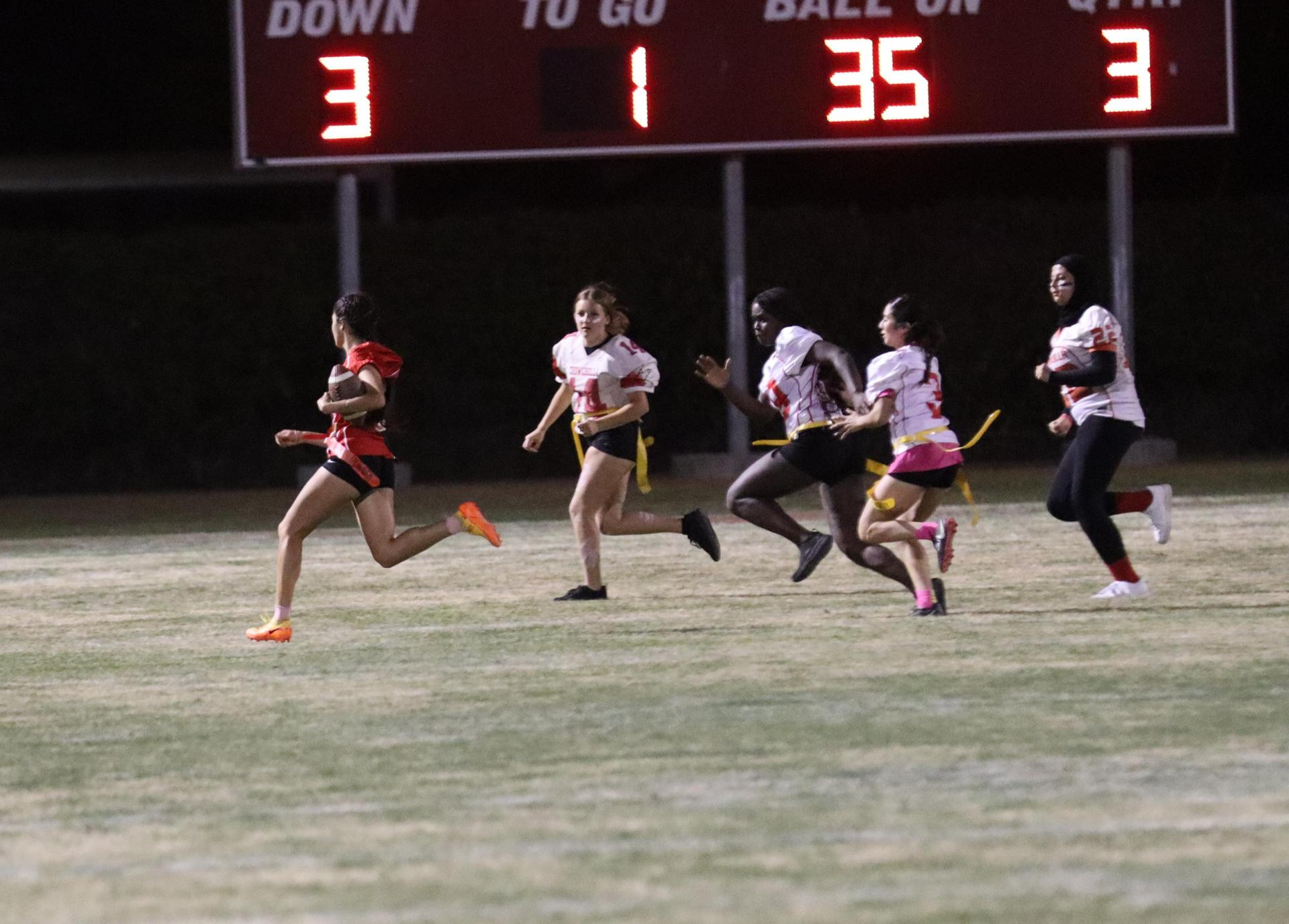 girls playing flag football