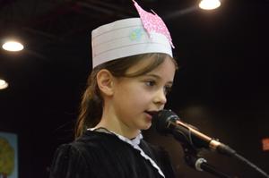 a girl saying her part during the chumash play