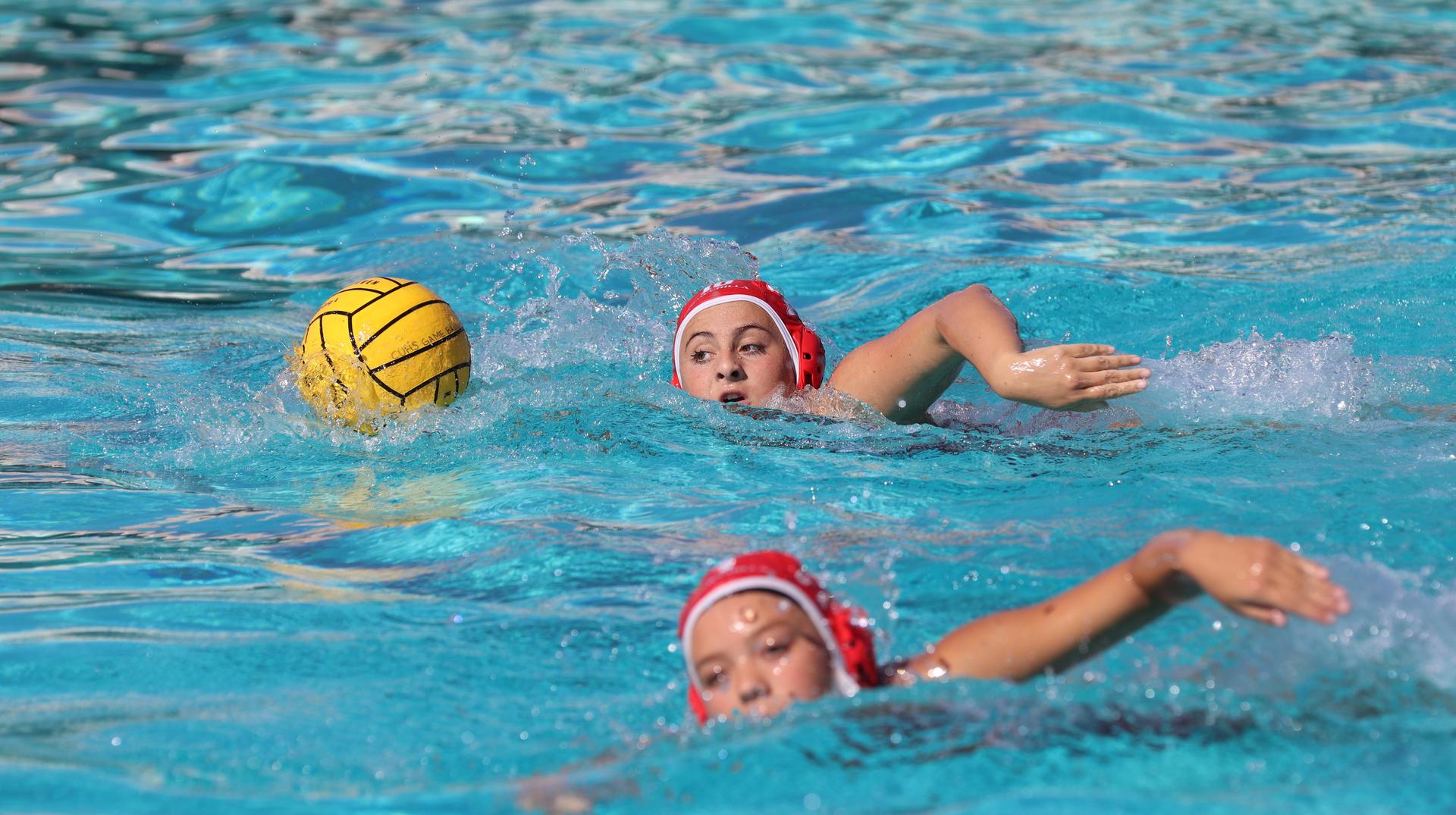 girls playing water polo against Hoover