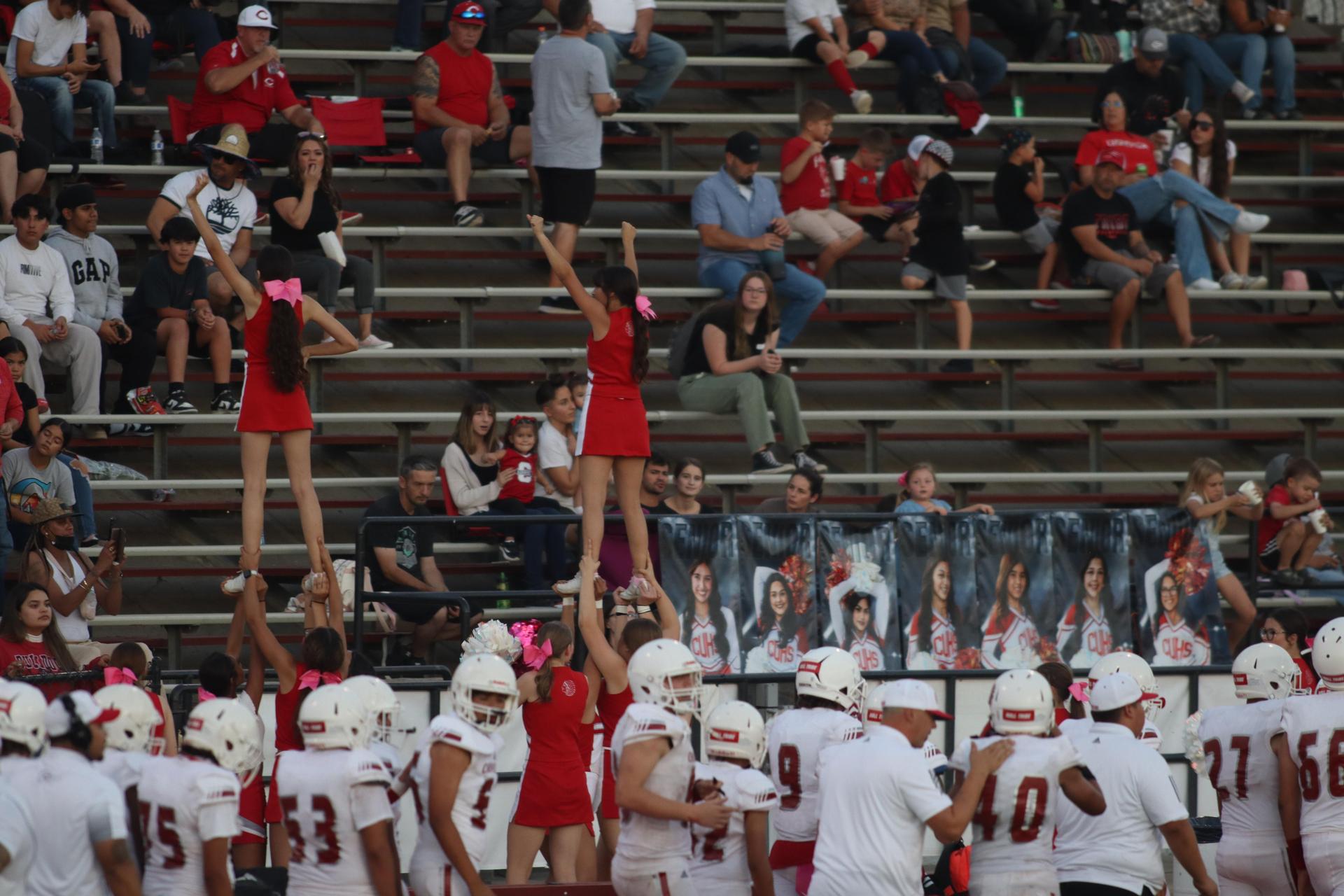 Junior Varsity football players in action against Caruthers