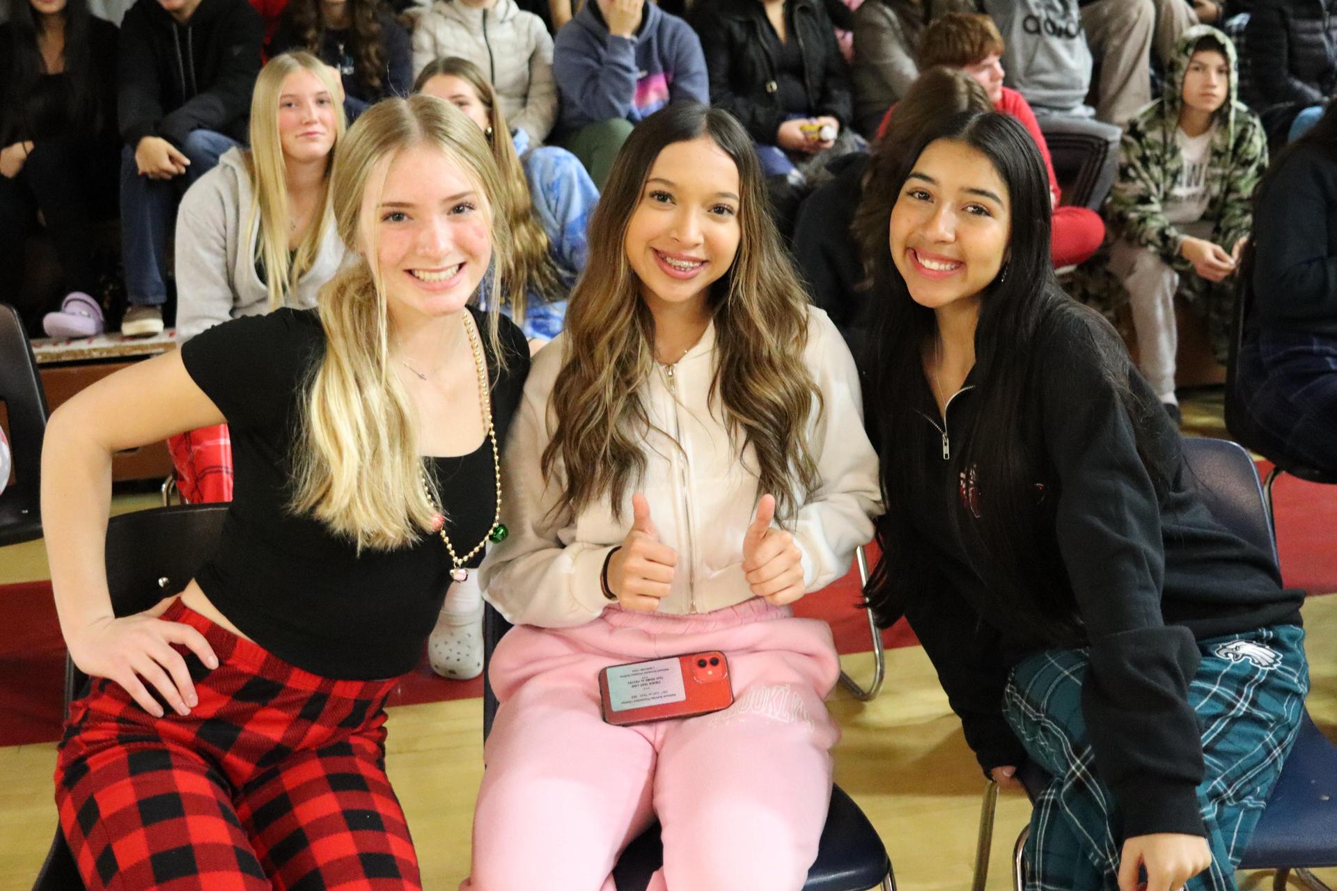 students and staff posing at the winter wishes rally