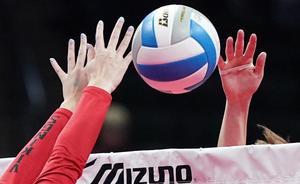 Volleyball player hands working for a volleyball.