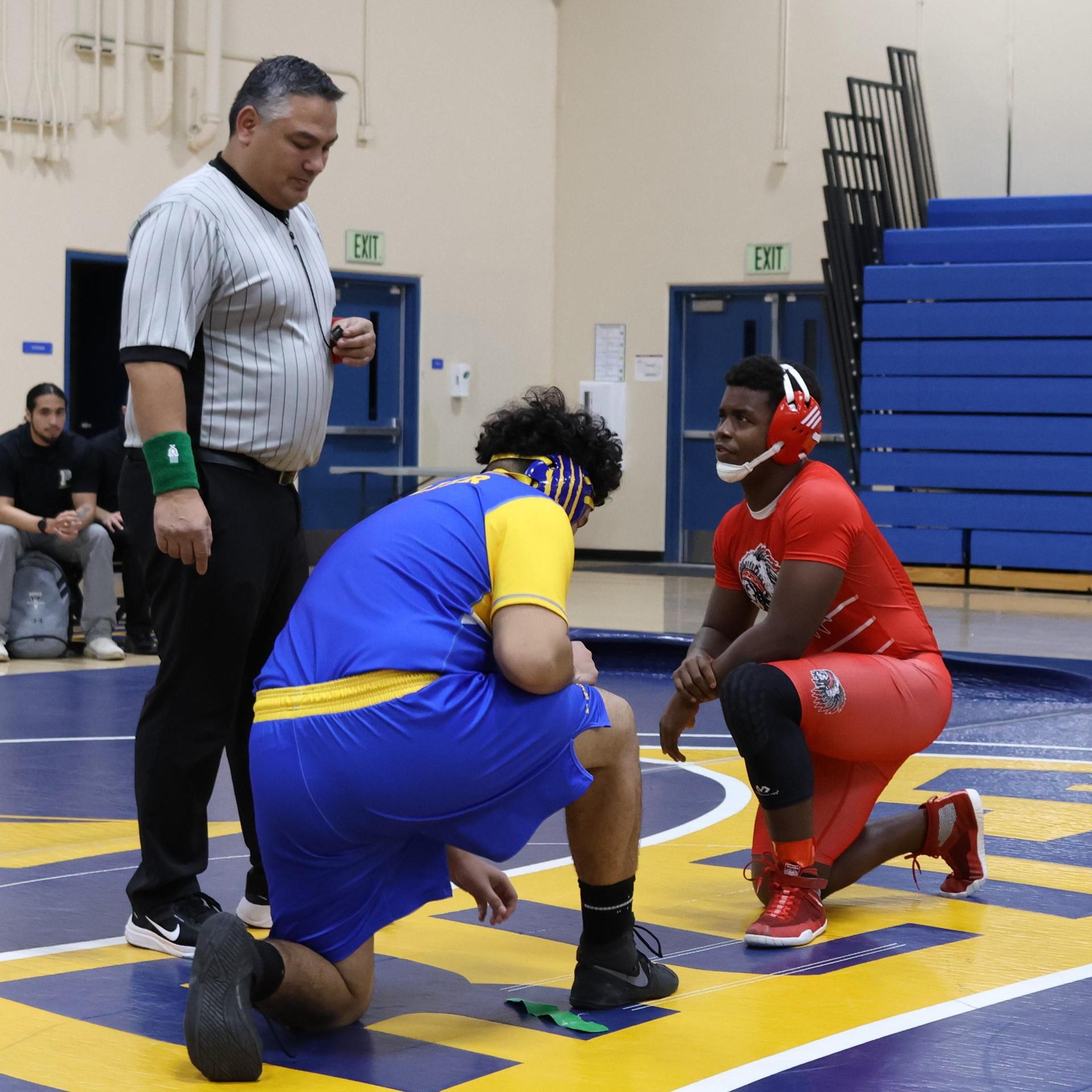 wrestlers in action at parlier