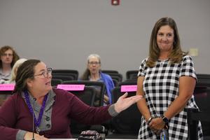 Kelly Umbach being recognized at a Board of Trustees meeting