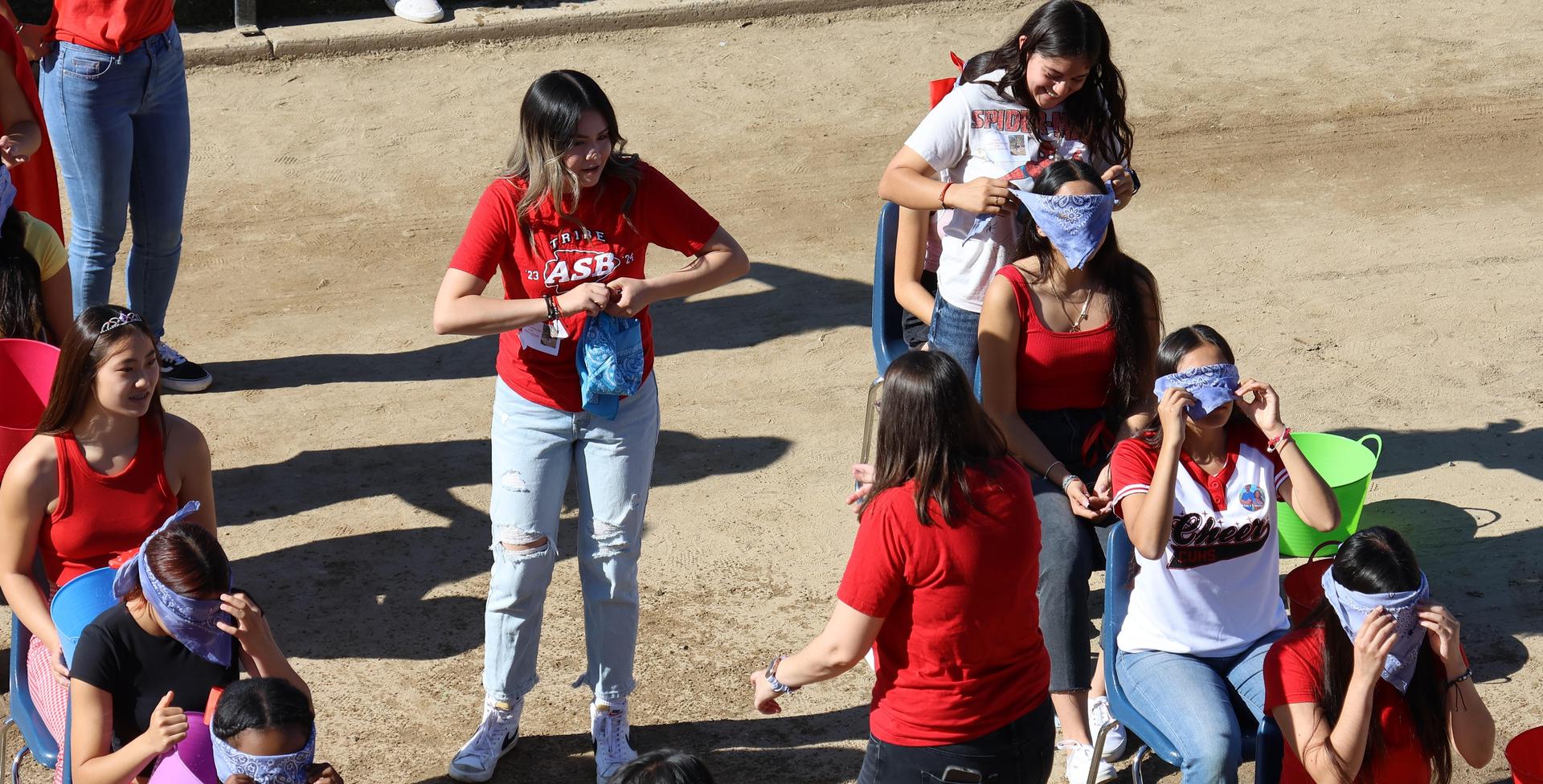 students and staff at the homecoming rally