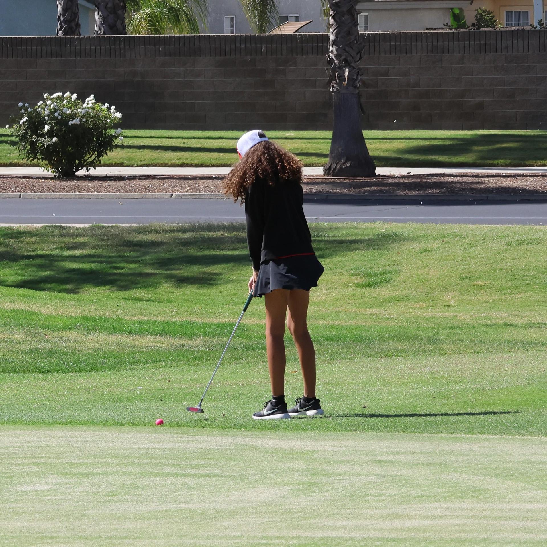 Girls golfers in action at the championships