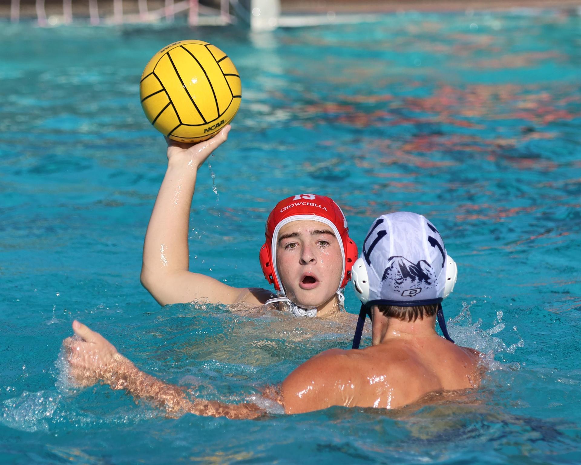 Boys playing water polo against Yosemite